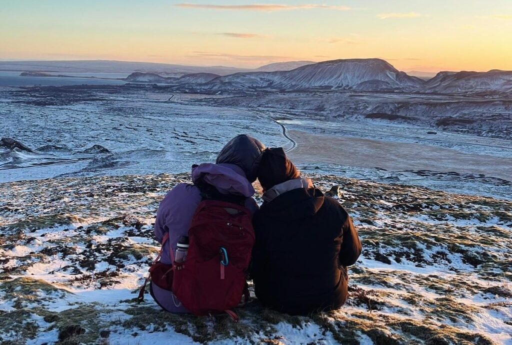two woman looking over iceland
